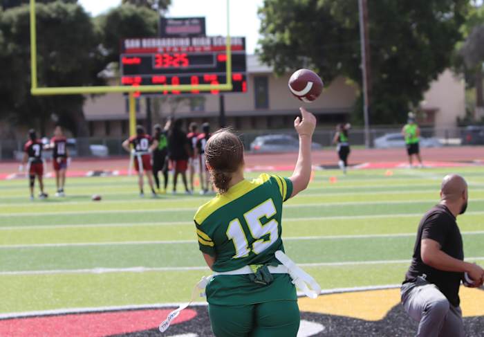 A would-be Aaron Rodgers shows off her arm. Photo: John Murphy